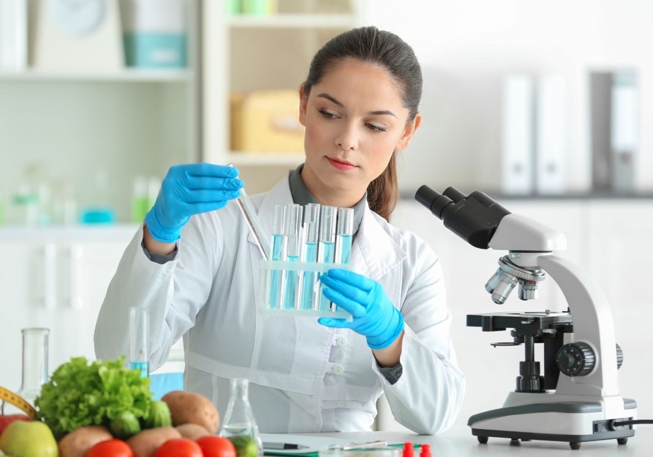 Chemist testing food in the microbiology laboratory