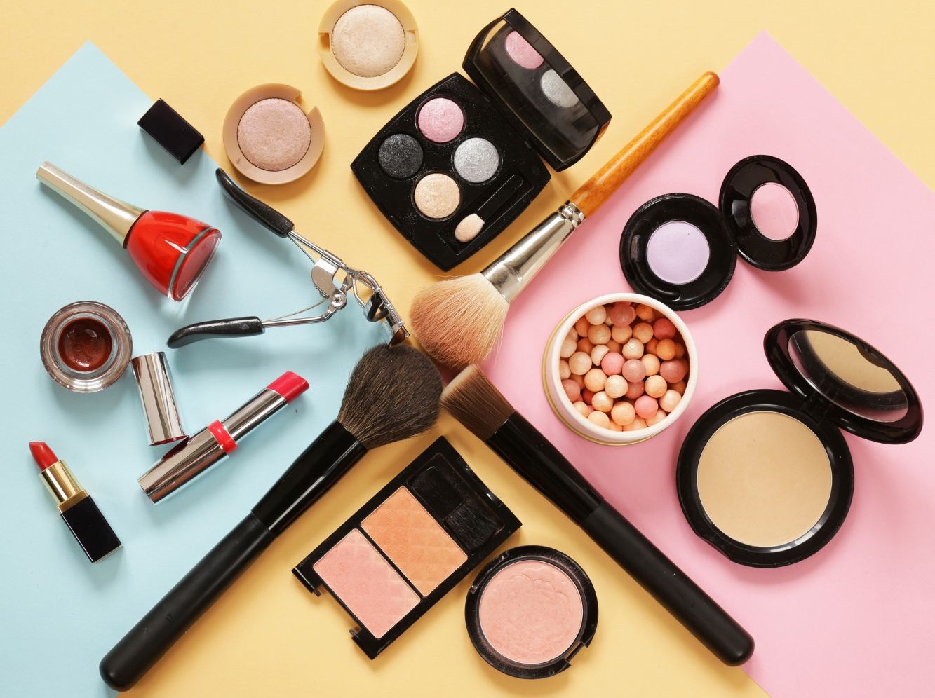 Cosmetic lipstick, nail polish, eyeliner, powder, blusher with the brush